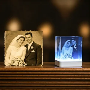 Personalized crystal photo cube showcasing a cherished family memory, a glowing gift for grandparents to treasure.